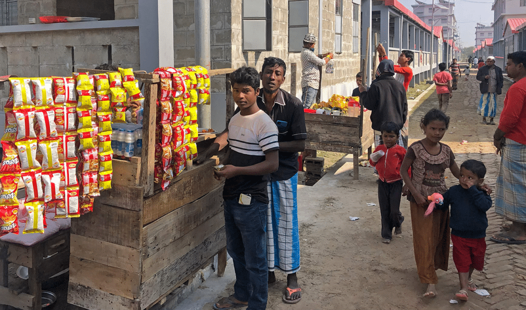 Bangladesh says photographer’s arrest not related to controversial transfer of Rohingyas