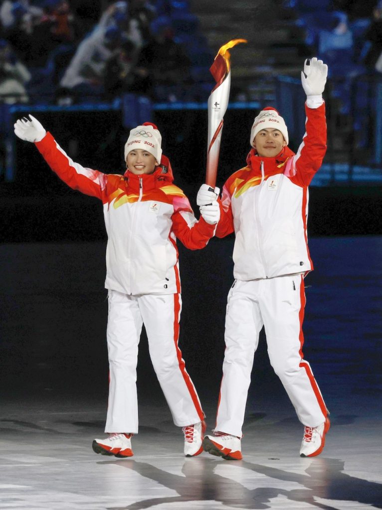 Uyghur skier says lighting Beijing Olympics cauldron “huge honor” Uyghur skier says lighting Beijing Olympics cauldron "huge honor"